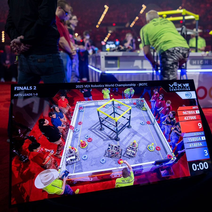 VEX TV feed on screen near a field at the VEX Robotics World Championship