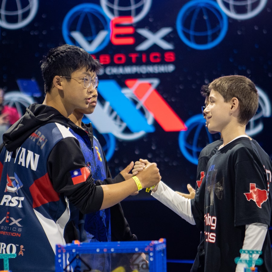 Participants shake hands after match at VEX Robotics World Championship