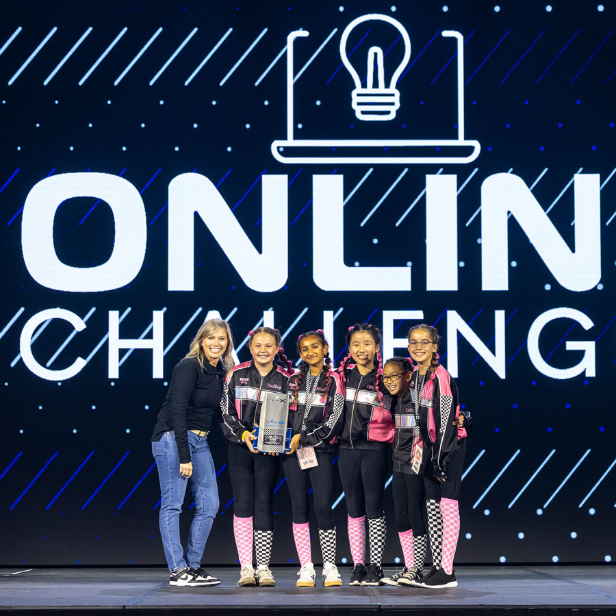 Team poses with Online Challenges Award at VEX Robotics World Championship