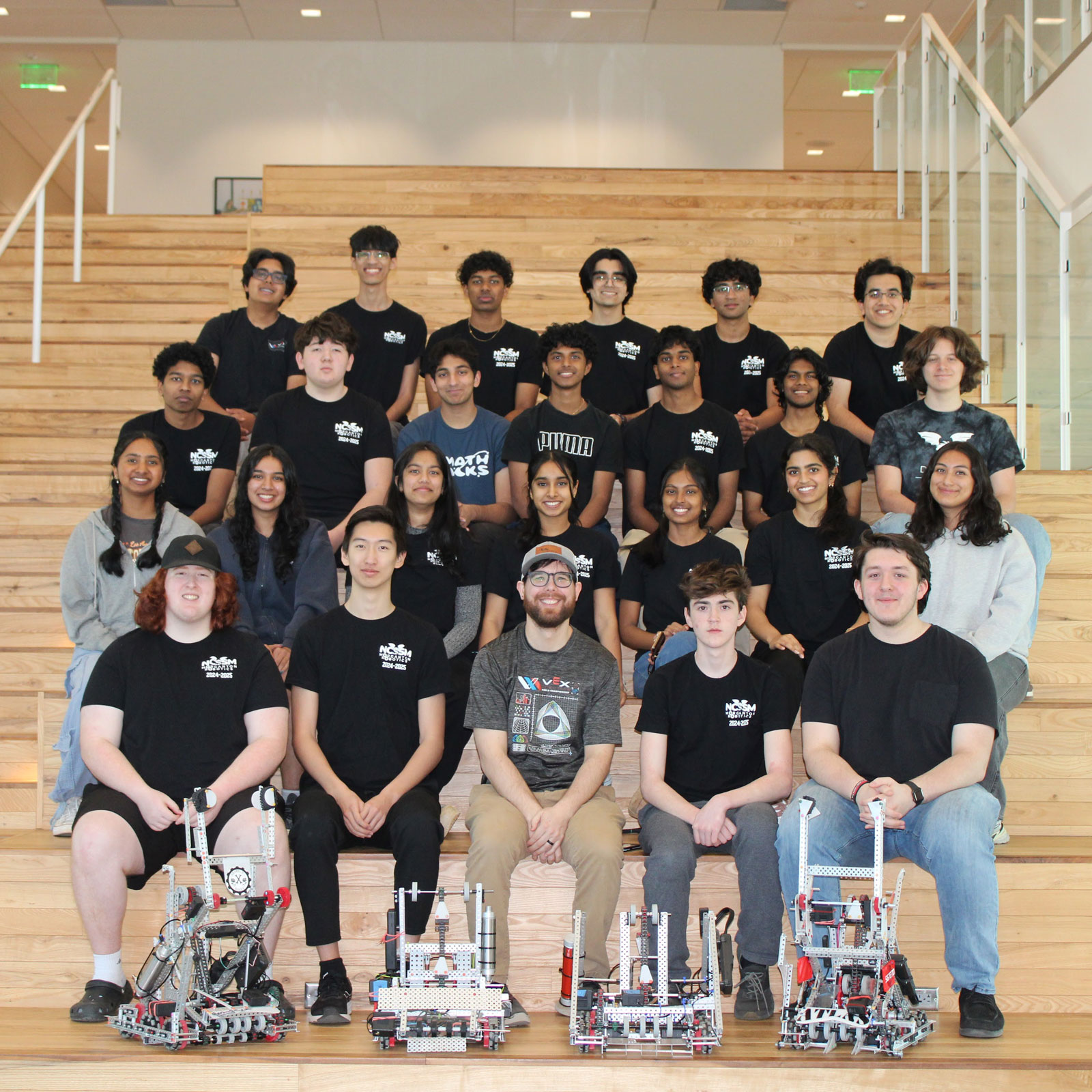 North Carolina School of Science and Mathematics-Morganton, computer science instructor Matt Hilton poses with his robotics team