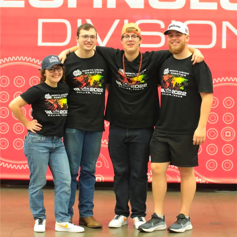 Nathan Matlack with his robotics team