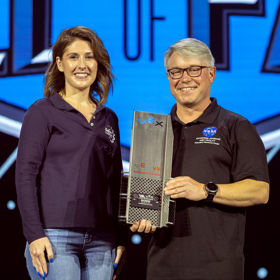 Todd Ensign accepts the Inspiration All Star Award at the 2025 VEX Robotics World Championship