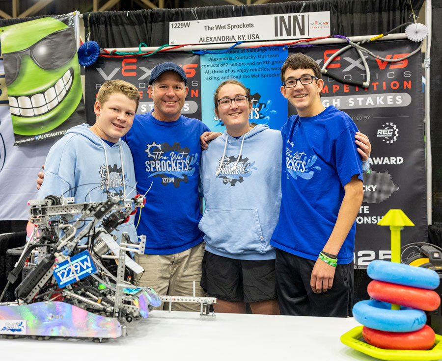 Team poses in the pits at VEX Robotics World Championship