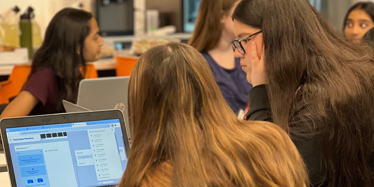 Students work together in the classroom