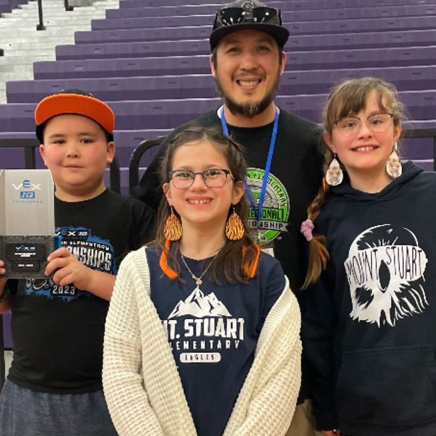 Jason Eng with his VEX Robotics team