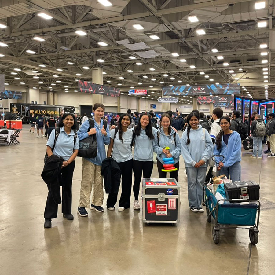 Team 1868A poses with their robot